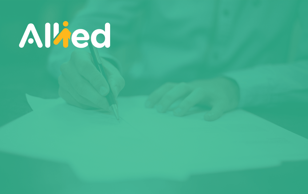 Green overlay on image of someone signing paper