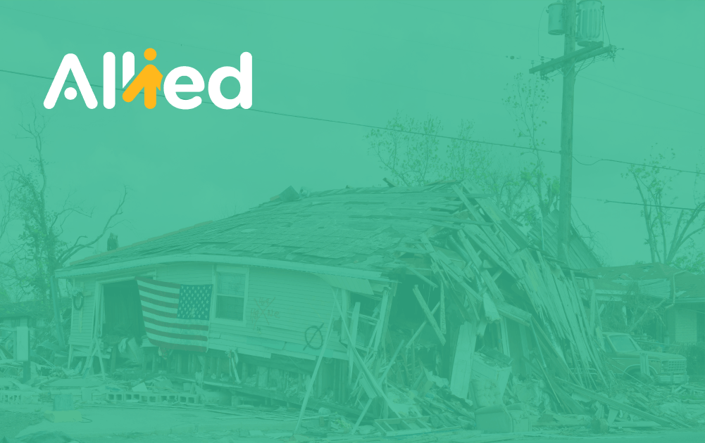 Banner image showing wind damage from a roof torn off